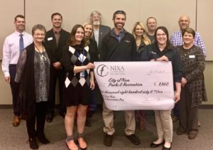 Nixa Community Foundation awarding Nixa Parks and Recreation and Christian County Library funding for Checkout Passes to the X Center and Aquatics Center